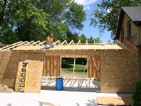 attaching a metal garage to a house|building a garage onto an existing house.